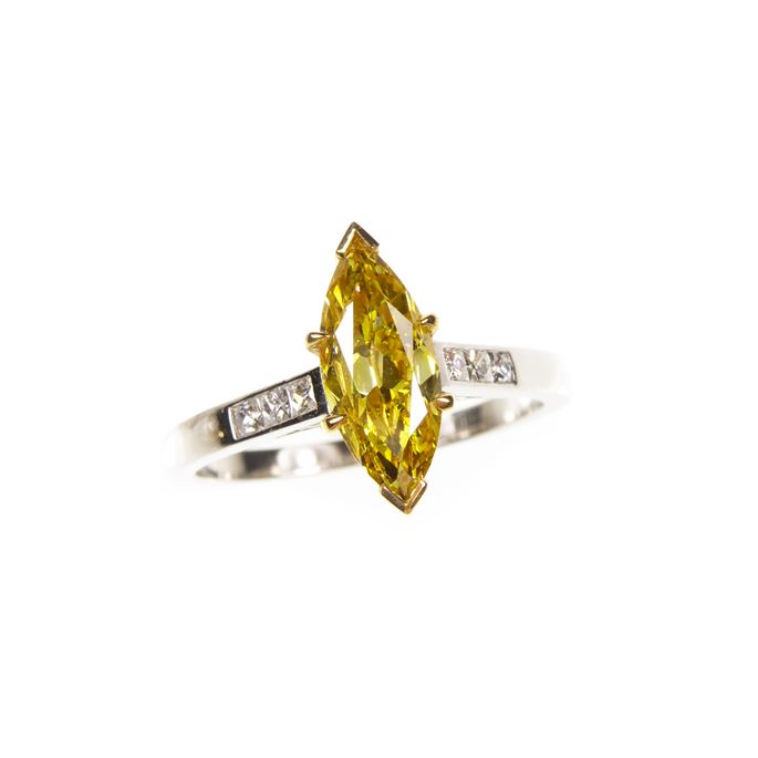 Single stone fancy deep yellow marquise cut diamond ring | MasterArt